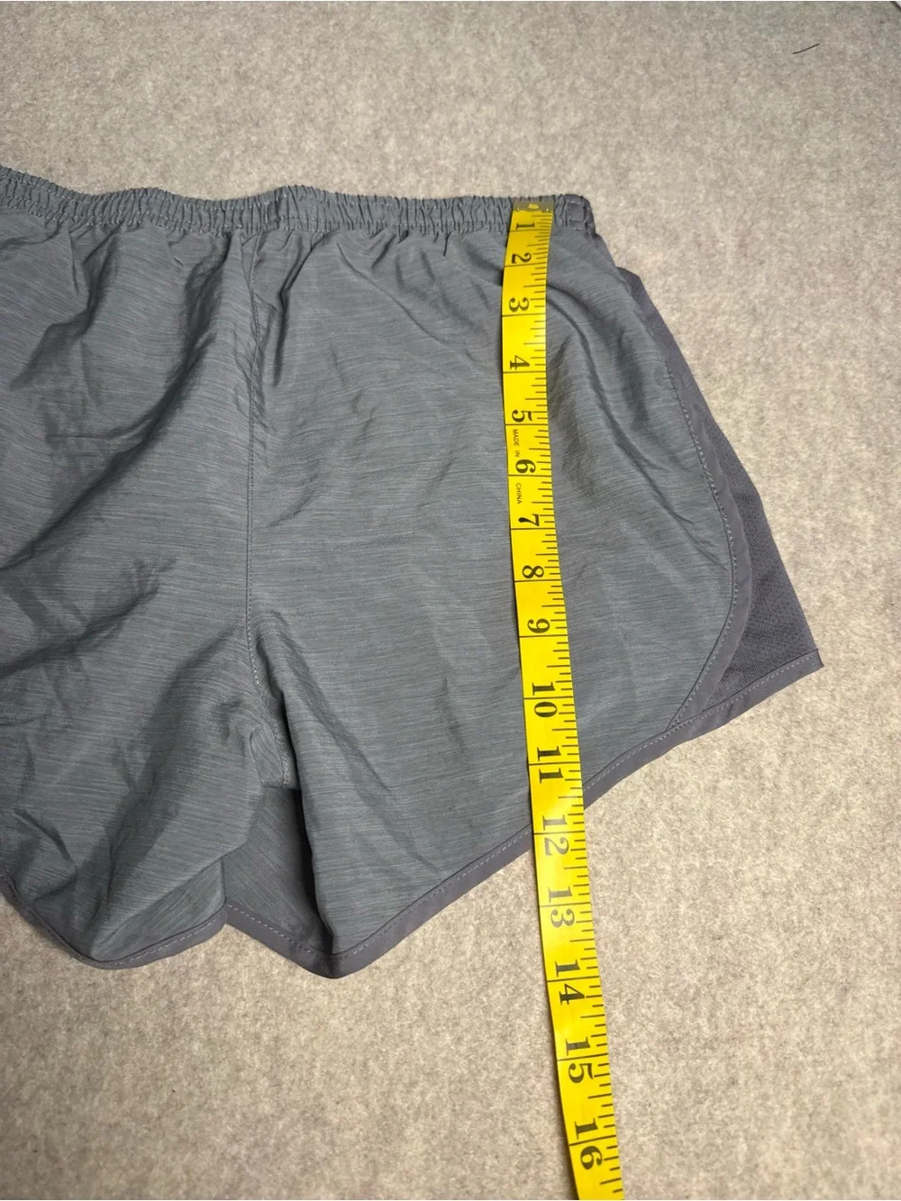 Nike Grey Athletic Shorts with White Swoosh